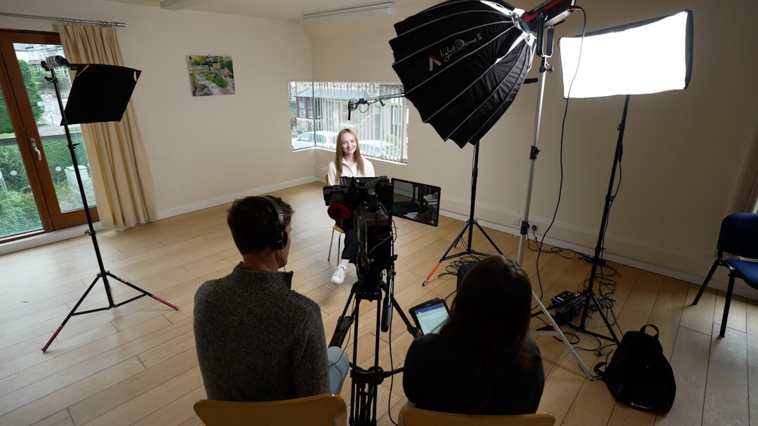 Professional TV studio interview setup with cameras and studio lights